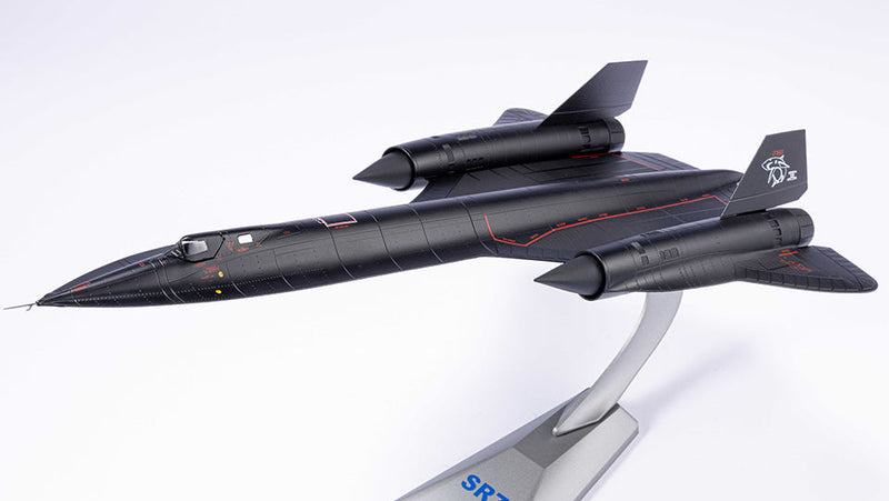 Model of a SR71 aircraft on a white stand with a white background